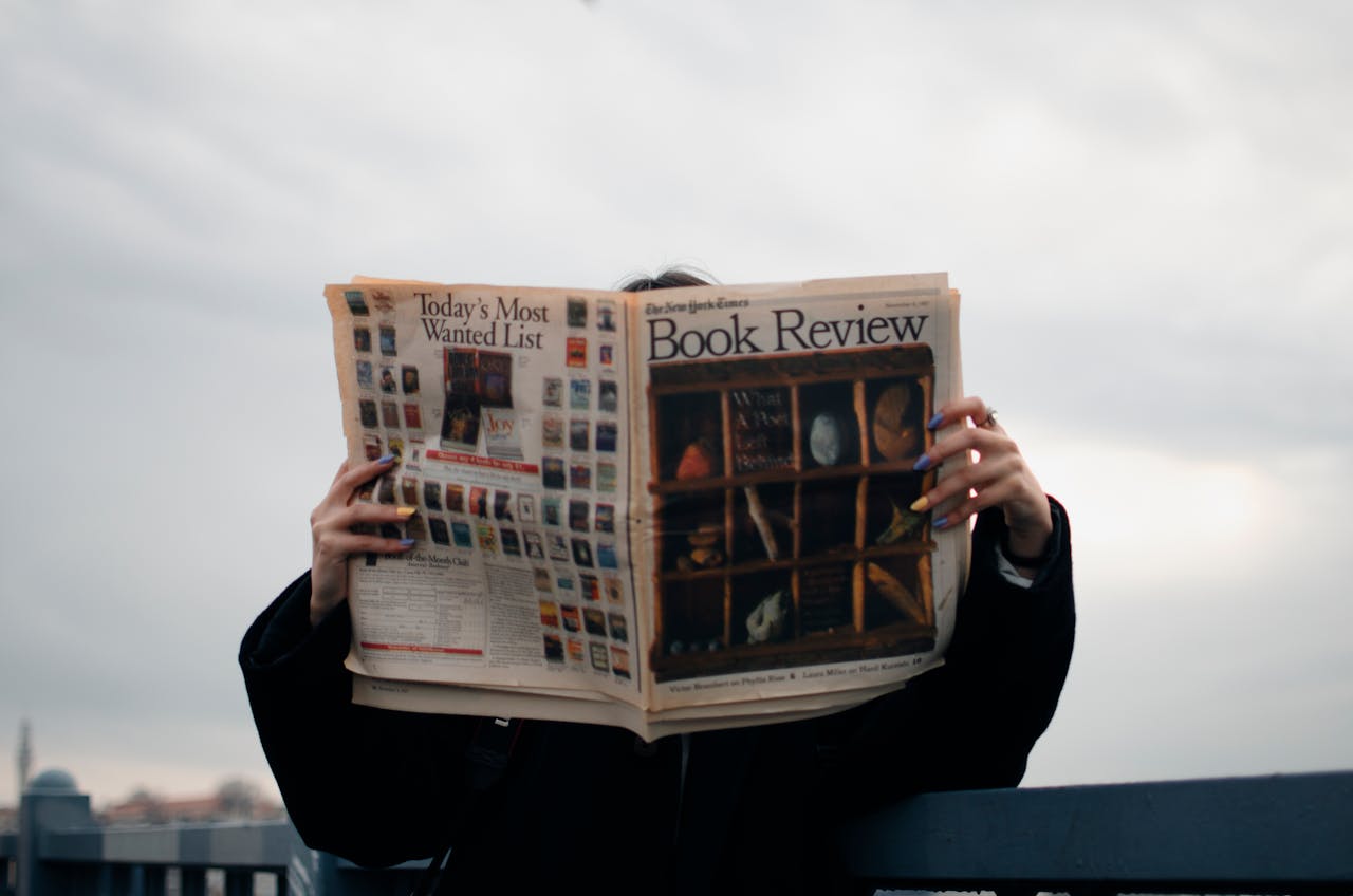 guy reading paper